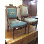 Two Victorian Mahogany Gothic style chairs with floral tapestry upholstery