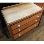 A light Oak chest of three drawers