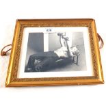 A print of Marilyn Monroe on an exercise bench,