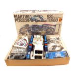 A boxed Tamiya Rico Martini Porsche racing car set