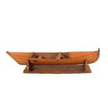 A wooden canoe on stand