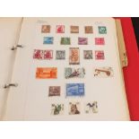 Three albums of Commonwealth stamps