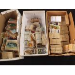 Three boxes of trade and cigarette cards