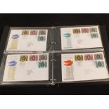 Five albums of first day covers,