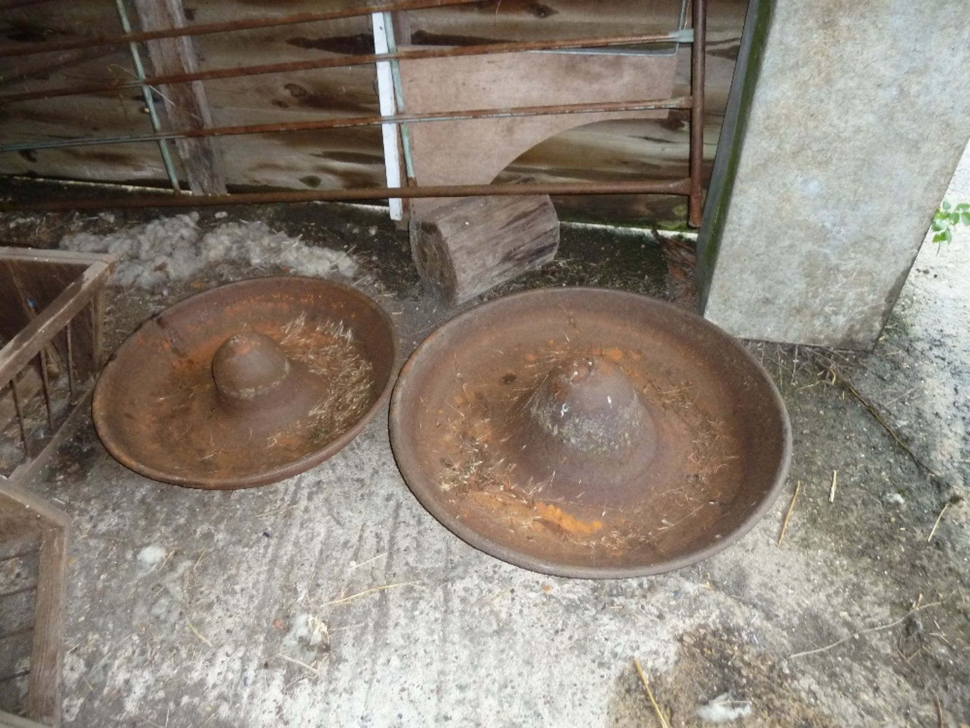 2 Mexican hat pig feeders, one marked Framlingham. Stored near Beccles. No VAT on this item.