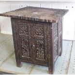 An Indian carved hardwood occasional table