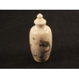 A Chinese Ivory snuff bottle with dragon and bird decoration