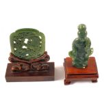 A Chinese carved Jade figure and reticulated plaque on wooden stands