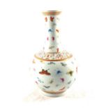 A Chinese vase painted with multiple butterflies and flowers,