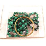 Two Malachite bead necklaces,