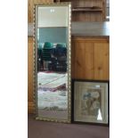 A rectangular gilt mirror plus a woolwork picture