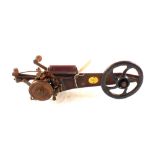 An unusual early Singer sewing mechanical device,