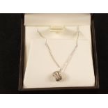 A 9ct White Gold three row Diamond pendant on chain