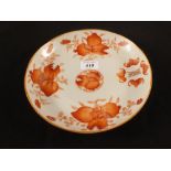 A 19th Century Chinese plate with orange floral decoration and calligraphy,