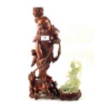 A Chinese hardwood carving of a fisherman,