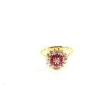 An 18ct Gold Ruby and Diamond ring,