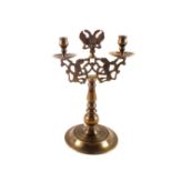 A heavy continental twin branch Brass candelabra with eagle head finial,