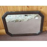 An Oak wall mirror, ship style clock,