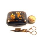 A black lacquer chinoiserie box, snuffers plus a small box with picture lid,