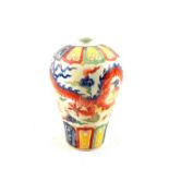 A Chinese narrow neck polychrome vase