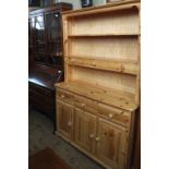 A modern Pine shelf back dresser