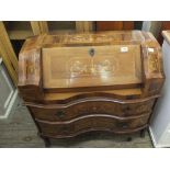 A continental Satinwood and Walnut inlaid bureau with two concave drawers