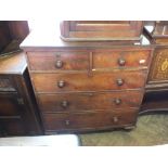 A 19th Century Mahogany chest of two short and three long drawers on turned feet