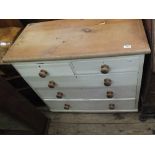 A Victorian white painted Pine chest of two short and three long drawers