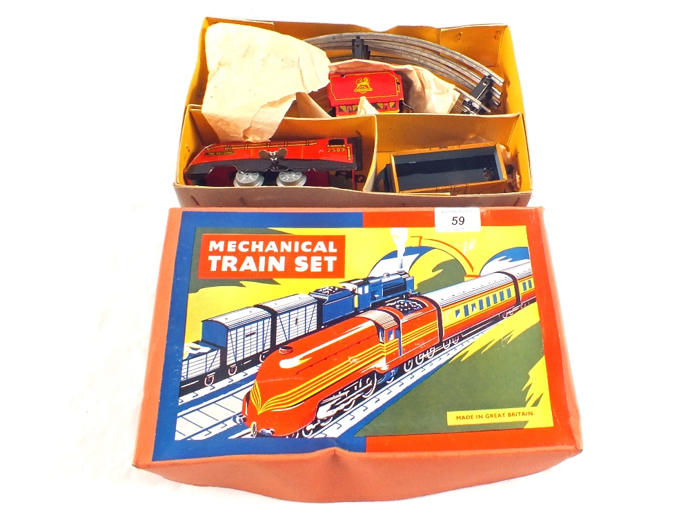 A boxed made in Gt Britain tin plate The National Mechanical Train Set No.