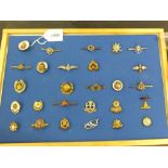 A collection of sweetheart brooches including Military Police and Coldstream Guards