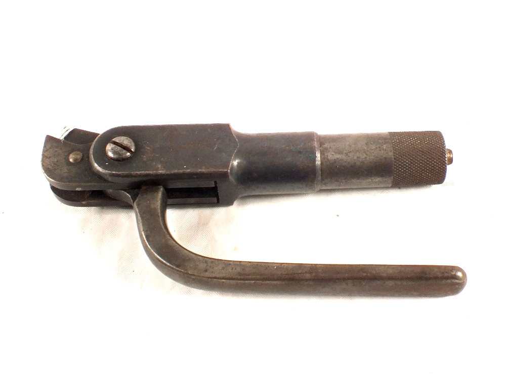 A Winchester reloading tool for the 32-40 cartridge,