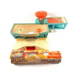 A boxed West German tin plate bus terminal (distressed box) and a Fisher Price garage