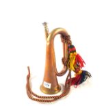 A copper and brass bugle by L.P.