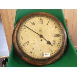 A GRVI round stained pine wall clock by Smiths with R.A.F.