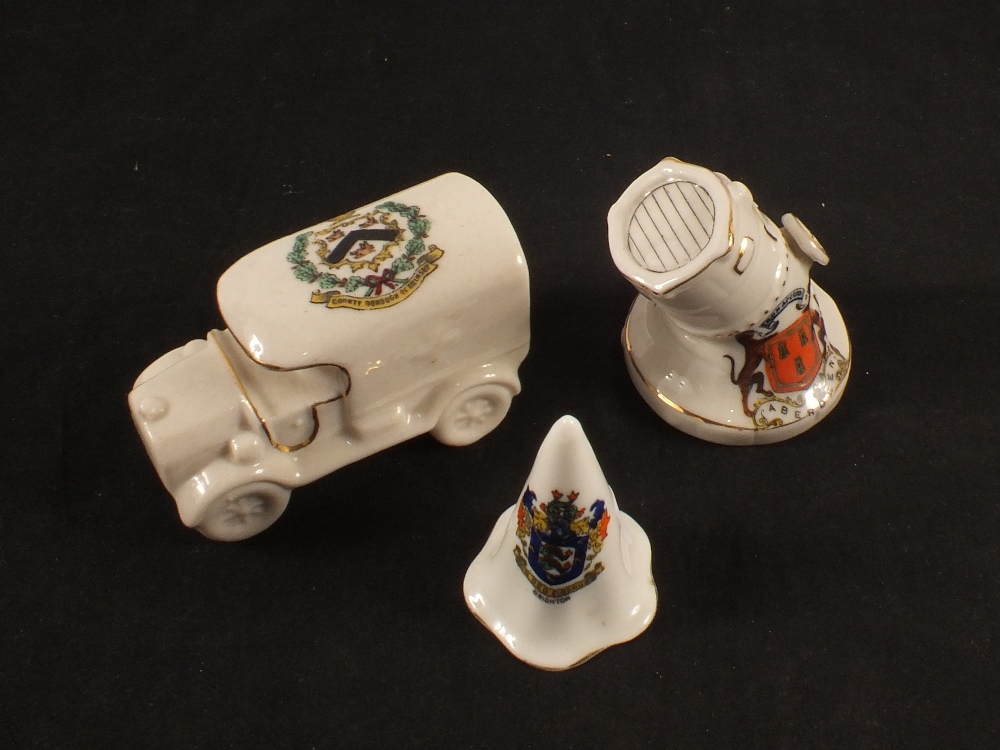 Three WWI era items of crested china including a search light and an ambulance