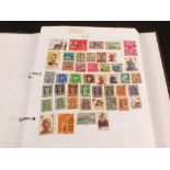 Three albums of world stamps