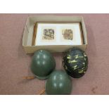 Three various military helmets with two framed and glazed Victoria Cross coloured prints