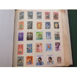 Four albums of world stamps,