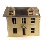 A dolls house and furniture