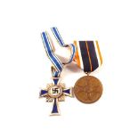 A German WWII (PATTERN) Mothers Cross and Merit medal