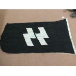 A German (PATTERN) black SS flag approx 5' x 3' with various stampings to the lanyard