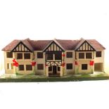 A Triang triple fronted dolls house and windows etc