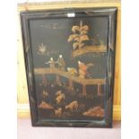 A Japanese black lacquer and gilt figure and deer decorated panel,