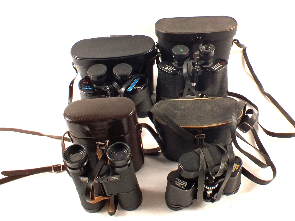 Four pairs of binoculars, Swift 8x40, Swallow 10x50,