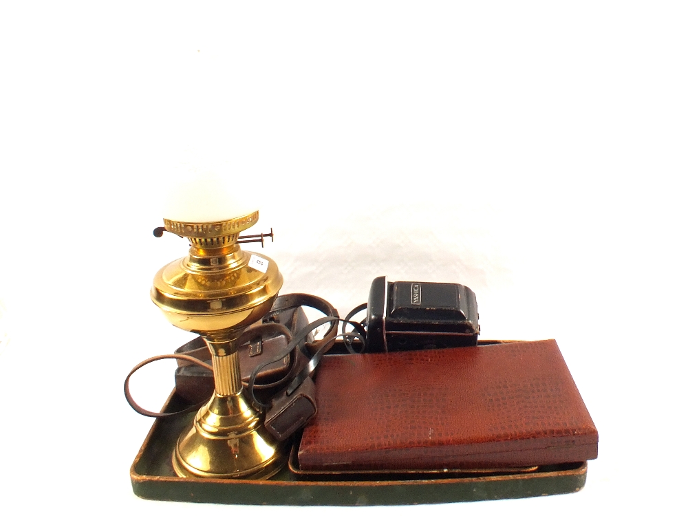 A Brass oil lamp,