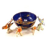 A Crescent ware blue ground chinoiserie fruit bowl plus four Goebels birds