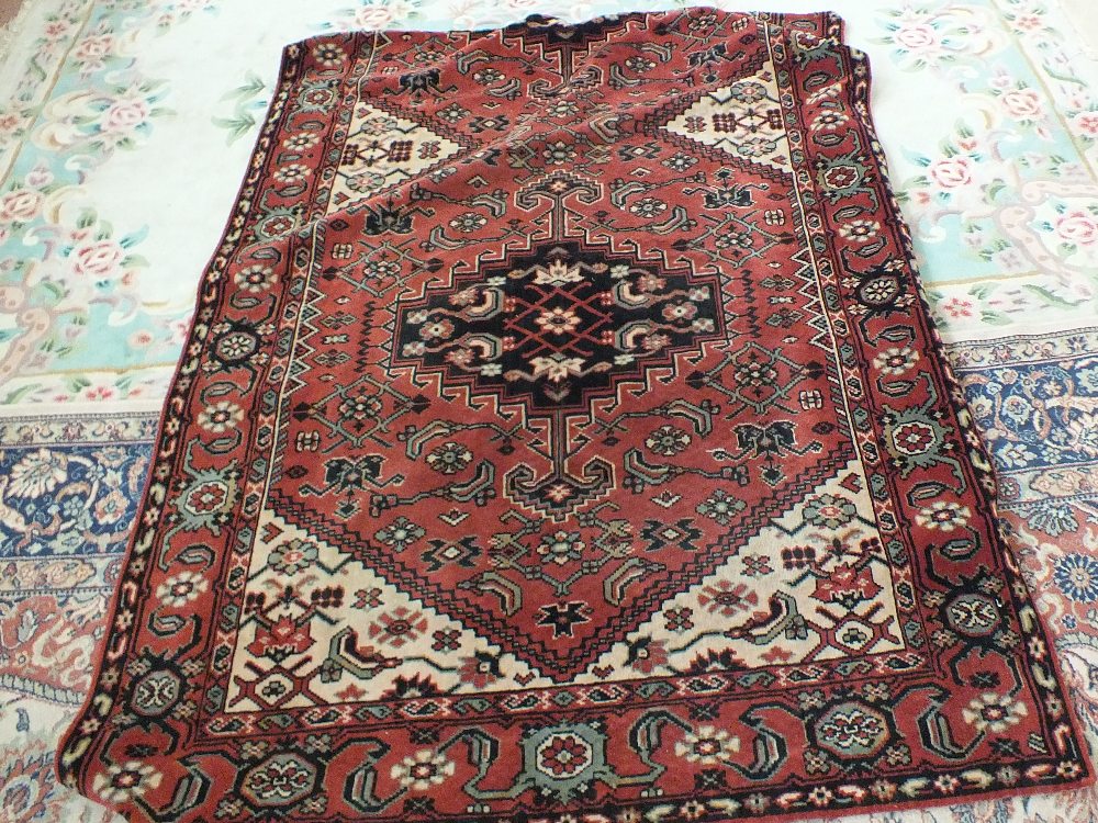 A Persian pattern floral rug,