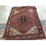 A Persian pattern floral rug,