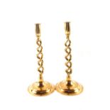 A pair of Edwardian open barley twist Brass candlesticks,