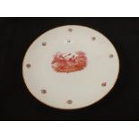 A 19th Century continental porcelain wall plate decorated with a courting couple having a picnic